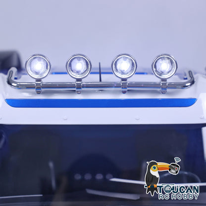 1/14 RC TOUCAN Truck LED headlight system detail with blue front lights and roof light bar