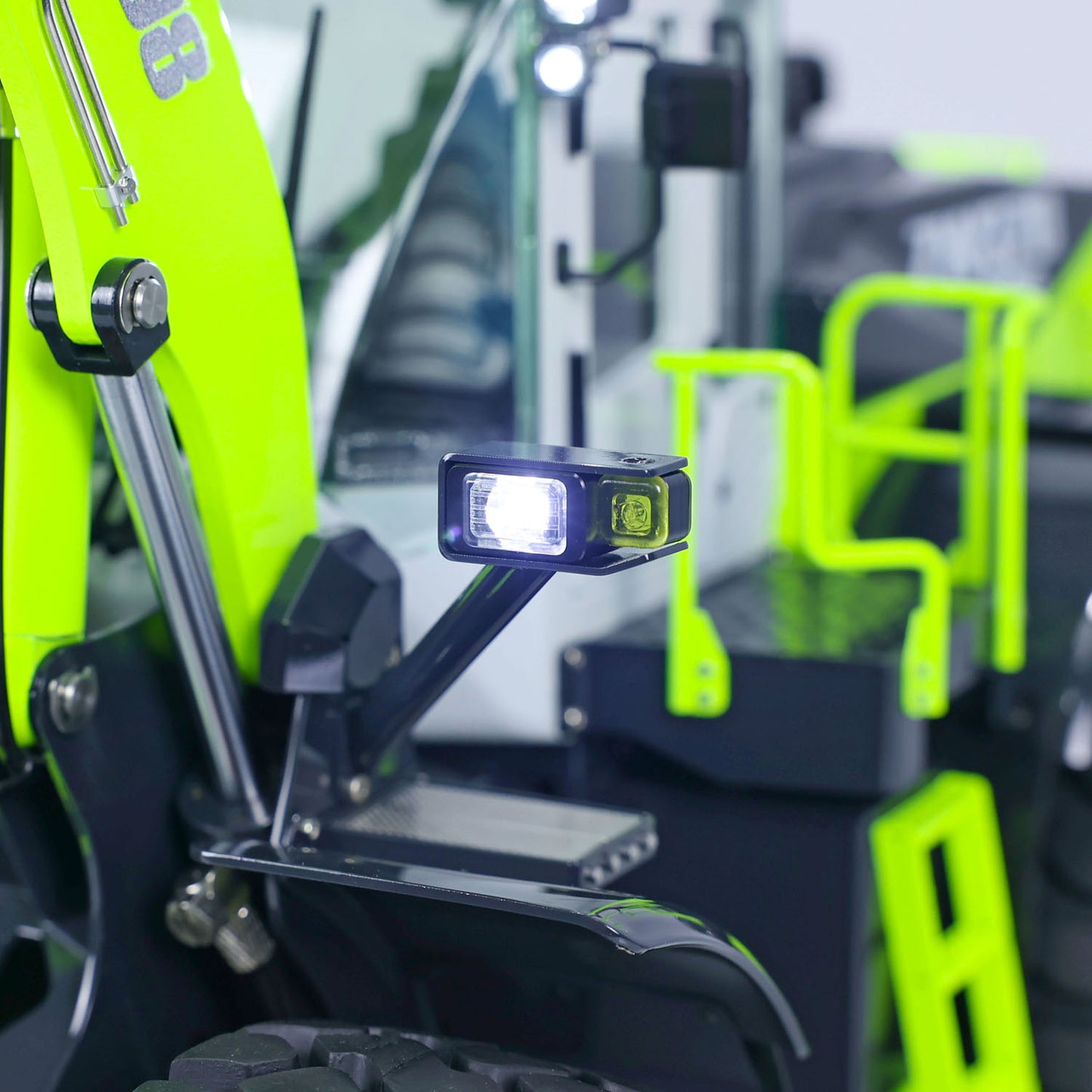 JDM-198 ZW370 RC loader LED headlights close up functional lighting system 1:14 scale metal construction truck detail