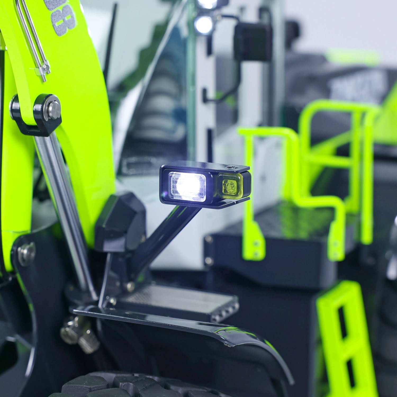 JDM-198 ZW370 RC loader LED headlights close up functional lighting system 1:14 scale metal construction truck detail