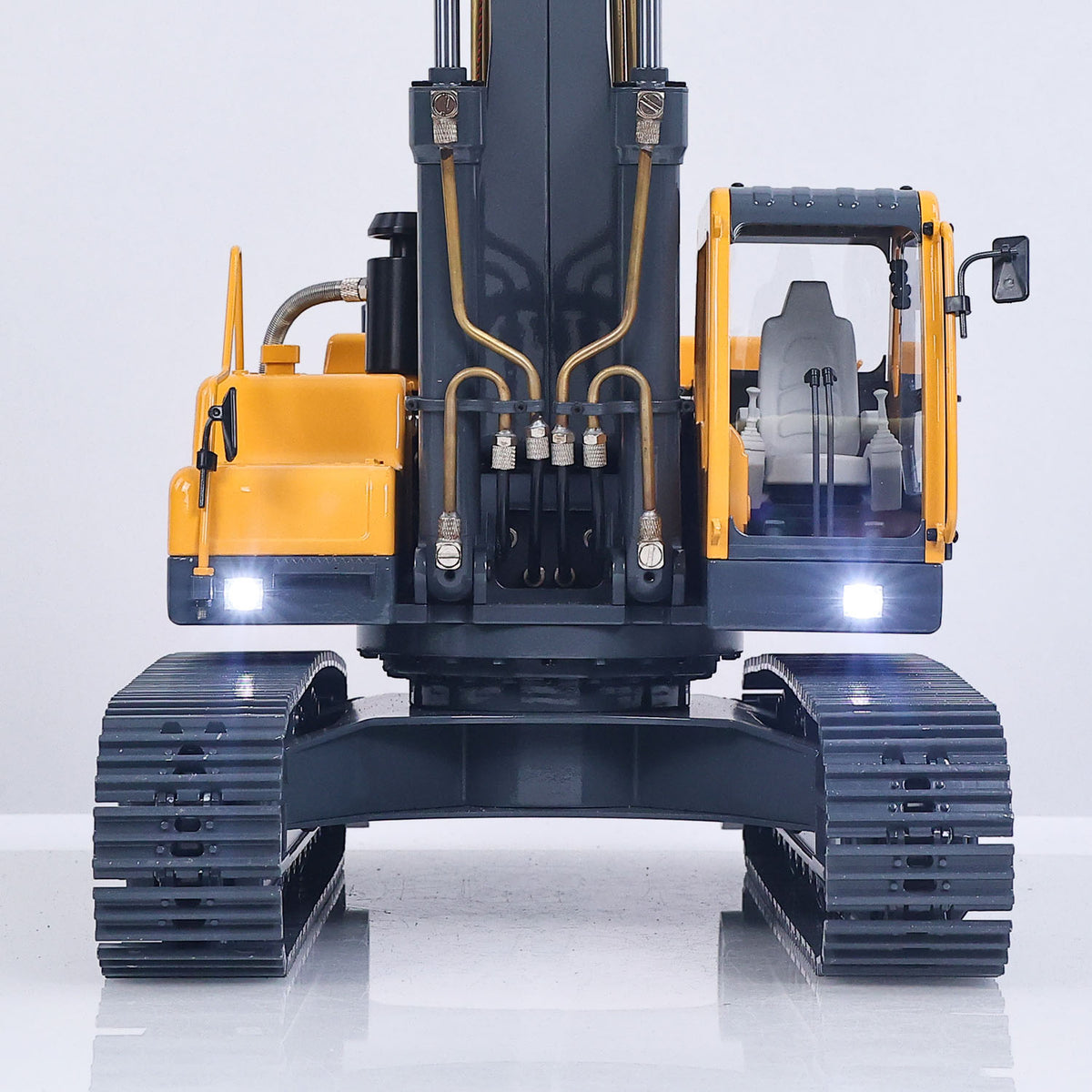 JDM V2 1/14 RC Metal Hydraulic Excavator Straight Front View, Illuminated Headlights, Integrated Working Light System