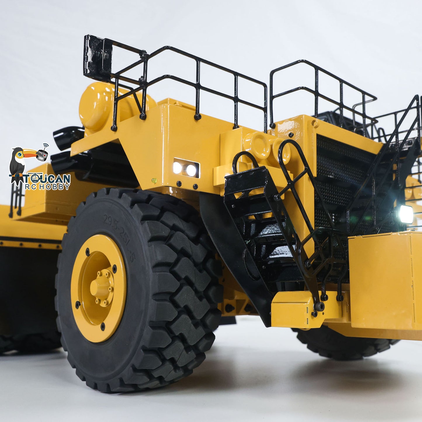 TOUCAN 1/20 RC 739D‑Extended Mining Tractor Front‑Side Close‑Up, Working Headlight, Oversized Mining Tire And Yellow Painted Wheel Hub Texture