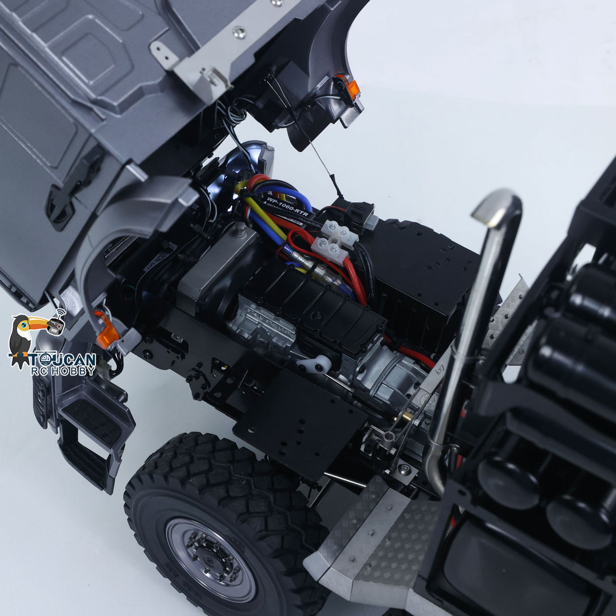 TOUCAN 1/14 RC 8x8 Off‑Road Tractor Truck Tilted Cab Close‑Up, Exposed Motor ESC Servo And Wiring Harness, 3‑Speed Metal Gearbox Internal View