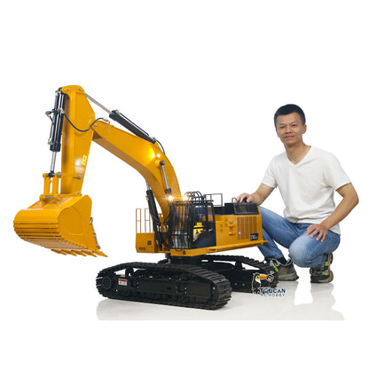 TYMX 1/8 hydraulic RC excavator yellow black front angle view